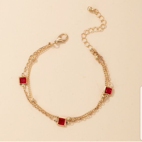 - Gold geometric bracelet - Picture 2 of 3